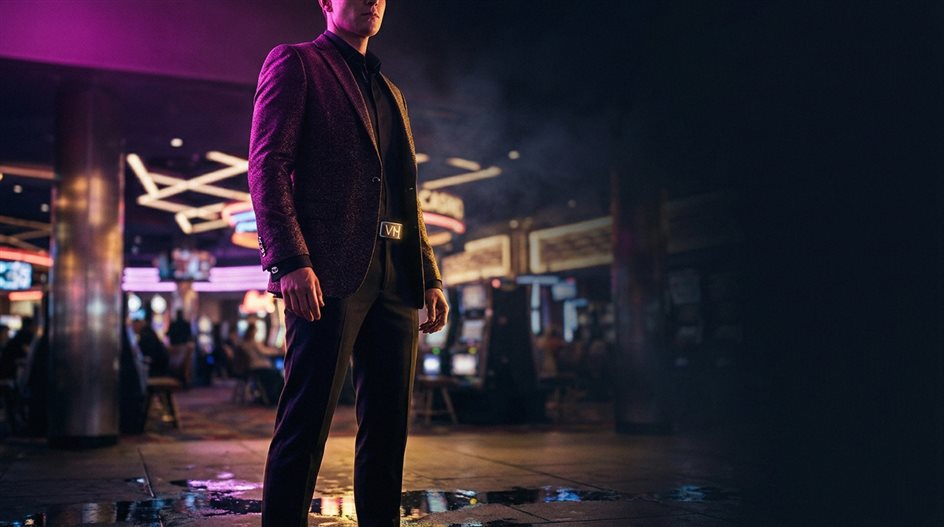 Gaming chips and playing cards on felt table